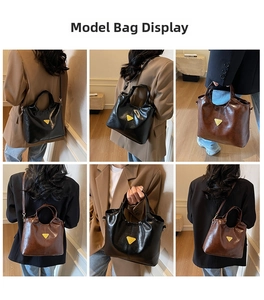 Detail of glossy patent leather tote bag with gold triangle logo and versatile strap