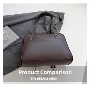 Detail view of large dark brown leather tote bag with a smartphone for size comparison