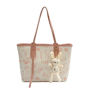 Cartoon graffiti tote bag in pink and white with a cute bunny charm and long straps