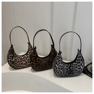 Detailed comparison of three leopard print hobo bags in light, dark, and grey tones