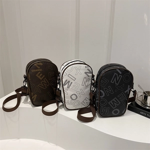 Mini crossbody bags in black, white, and brown with letter patterns and wide straps