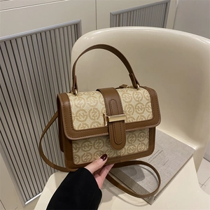 Retro brown leather patchwork handbag with letter prints and gold metal buckle