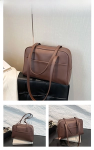 Detailed close-up of brown PU leather shoulder bag with front pockets and top zipper