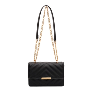 Classic black quilted shoulder bag with V-shaped stitching and gold metal buckle detail
