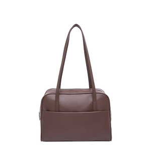 Vintage dark brown faux leather shoulder bag with long handles and a front pocket