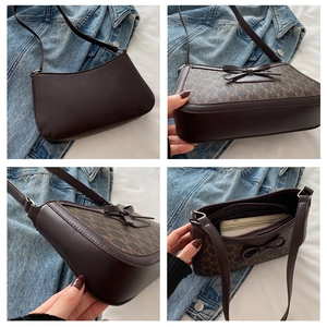 Detail views showing brown bow baguette bag with M-pattern print and interior compartments