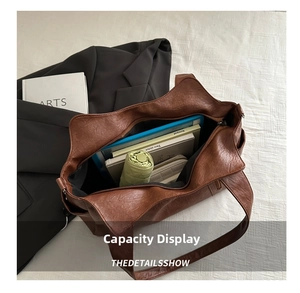 Detailed interior of a brown leather tote bag showing spacious capacity for daily essentials