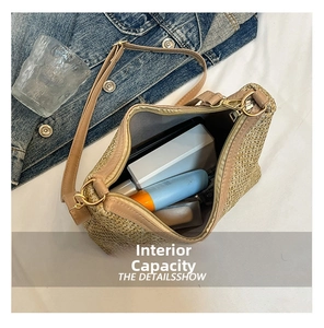 Top view showing the large internal capacity of the woven straw tote bag with essentials