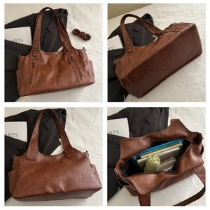 Macro details of brown retro textured tote bag with multi-pockets and large capacity