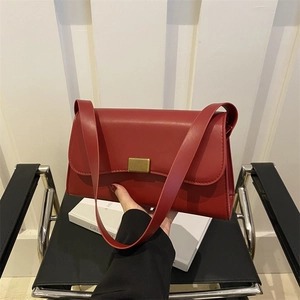Retro red faux leather crossbody bag with golden vertical textured metal lock buckle