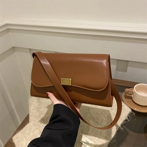Vintage brown leather crossbody square bag with gold metallic buckle and shoulder strap