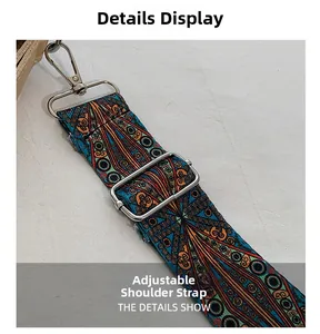 Detail of adjustable ethnic pattern wide shoulder strap with silver metal buckles