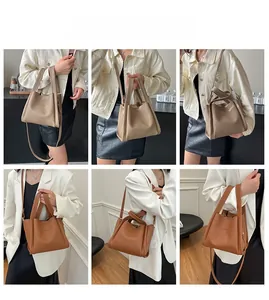 Litchi pattern leather bucket bag detail showing grey and orange models in use