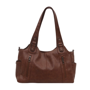 Vintage brown tote bag with zipper details and rivets for stylish commuting women