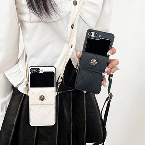 Funda de cuero para teléfono tipo billetera con diseño de camelia y correa ajustable
