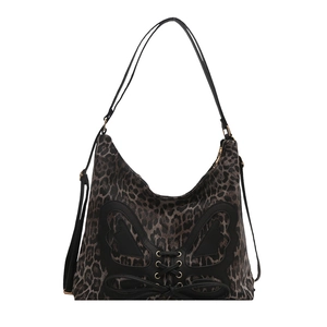 Retro leopard print tote bag featuring black butterfly leather patch and lace-up detail