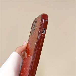 Close-up of wine red glitter phone case for iPhone 16 Pro Max with sparkling sequin finish