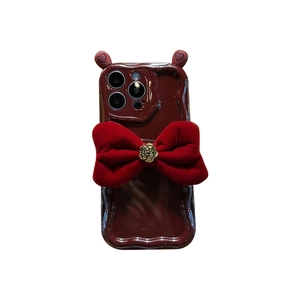 Dark red wavy silicone case for iPhone with velvet bow and golden rose pendant charm