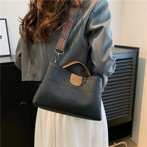 Chic black PU leather tote bag with brown handles and colorful wide strap for women