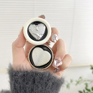 Minimalist heart-shaped expanding phone socket grip in elegant gold and white finish