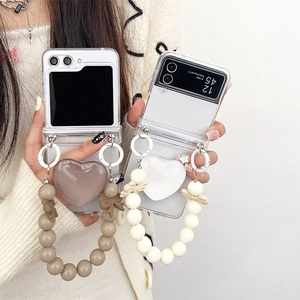 Transparent Folding Smartphone Case With 3D Heart Airbag Stand And Bow Bead Hand Chain Strap Shockproof Ins Style