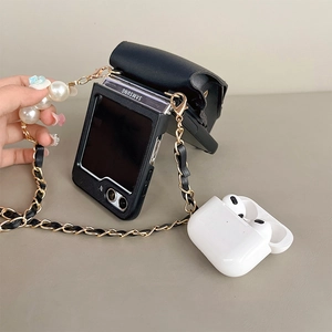 Detail of black Z Flip phone case with leather wallet pouch and pearl crossbody chain