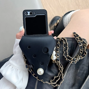 Detailed view of cheese-shaped leather flap and large pearls on Galaxy Z Flip case