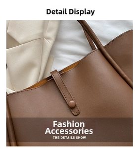Close-up detail of smooth brown matte leather finish and neat stitching on tote bag