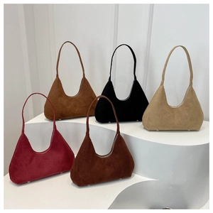 Detailed display of five matte suede hobo bags in various colors with metallic base studs