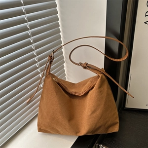 Retro brown suede shoulder bag with large capacity and minimalist commuter style design