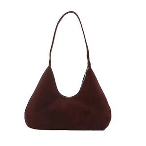 Minimalist burgundy suede shoulder bag with matte finish and triangular design for women
