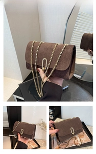 Detail of coffee brown suede chain bag featuring a gold metal buckle and side views