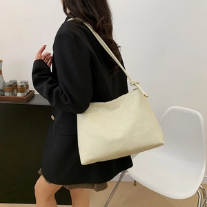 Retro cream white tote bag with geometric embossing and knotted shoulder strap