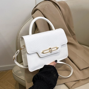 White woven textured top-handle bag with gold twist lock and adjustable shoulder strap