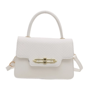 Minimalist pearl white hard shell box bag with snake pattern and gold metal lock detail