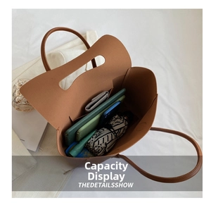 Large capacity tote bag interior showing ample space for umbrella and daily essentials