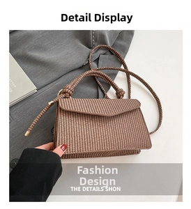 Detail shot of brown woven texture small square bag with knot handle and shoulder strap