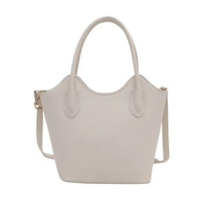 Minimalist off-white bucket bag with wavy edge design and adjustable shoulder strap
