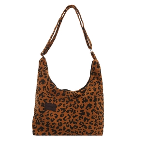 Borsa tote retrò in velluto a coste leopardato con etichetta moda su sfondo bianco