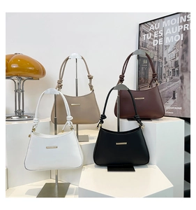 Sacs demi-lune minimalistes en quatre couleurs avec barre dorée et nœuds décoratifs