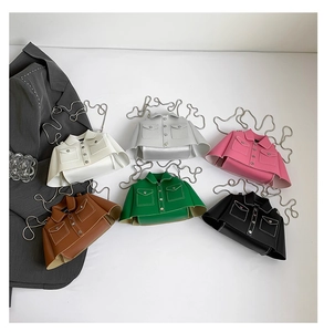 Selection of creative jacket-shaped handbags in candy colors with chain straps