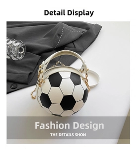 Detail of football-shaped handbag with black and white PU leather and golden chain