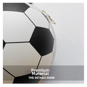 Close-up of premium soccer ball shaped bag showing grainy PU leather texture and gold zipper