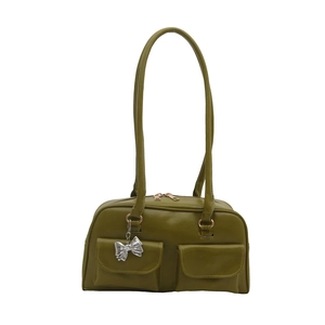 Minimalist olive green shoulder bag with double front pockets and silver bow charm accent