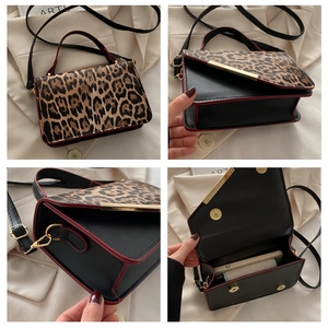 Detailed close-up of leopard print flap bag featuring red edges and metal hardware