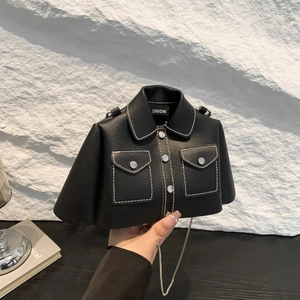 Unique shirt-shaped black leather crossbody bag with white stitching and silver chain