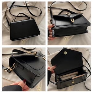 Detailed interior and exterior views of black crossbody bag with gold U-shaped buckle