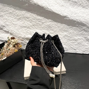 Fashionable black sequin bucket bag with silver chain and pearl charms for women