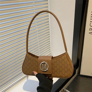 Retro brown baguette shoulder bag with all-over M-letter print and silver metal logo