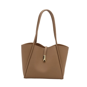 Minimalist brown faux leather tote bag for women featuring stylish golden metal buckles